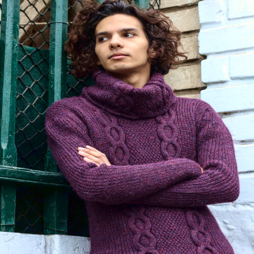 A model wearing the turtleneck jumper. You can notice all the knitting details.