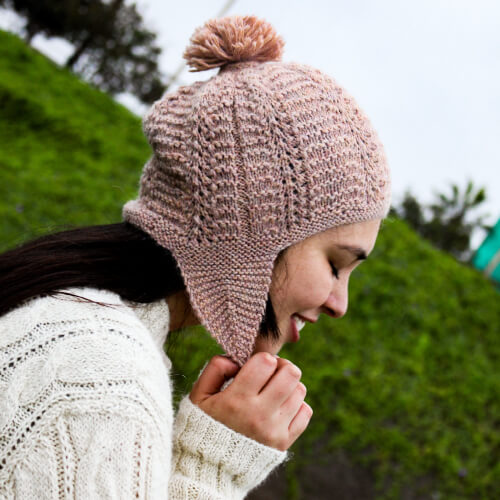 Photo of a baby alpaca wool chullo for women with small earflaps.